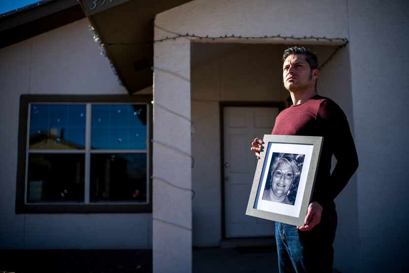 Armando Martínez, 35, with the portrait of his mother and best friend, Maria Oralia Lugo, 56.