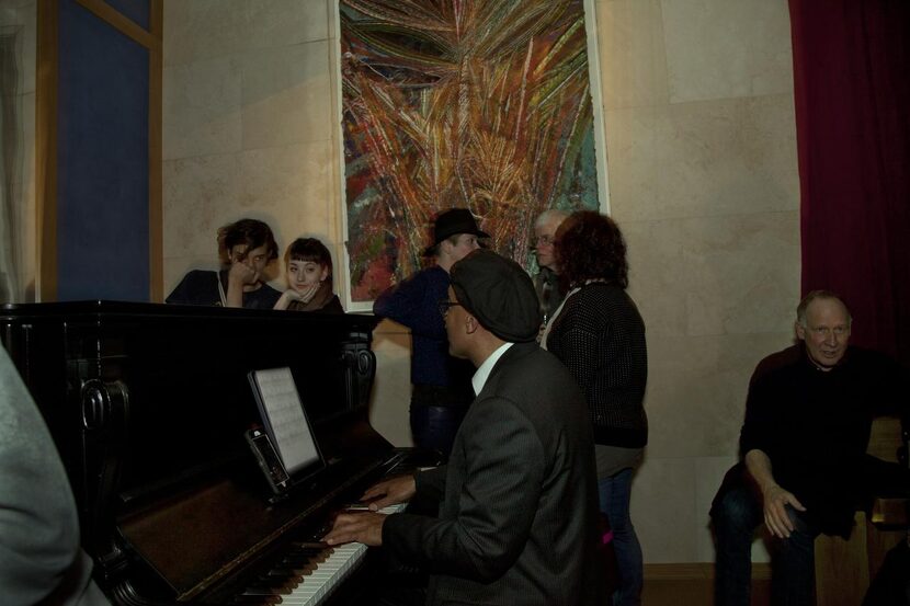 
Patrons enjoy music and art inside Chalet Dallas.
