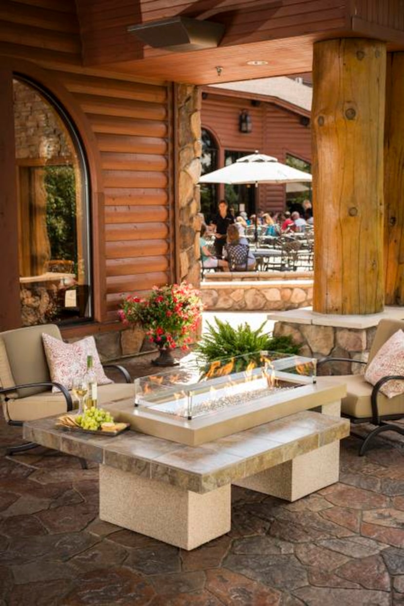 
Gas-fueled fire pit tables can add comfort to outdoor spaces all year long. 
