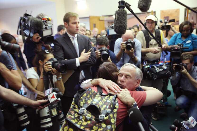 Texas governor Greg Abbott greets worshippers before a worship service at Arcadia First...