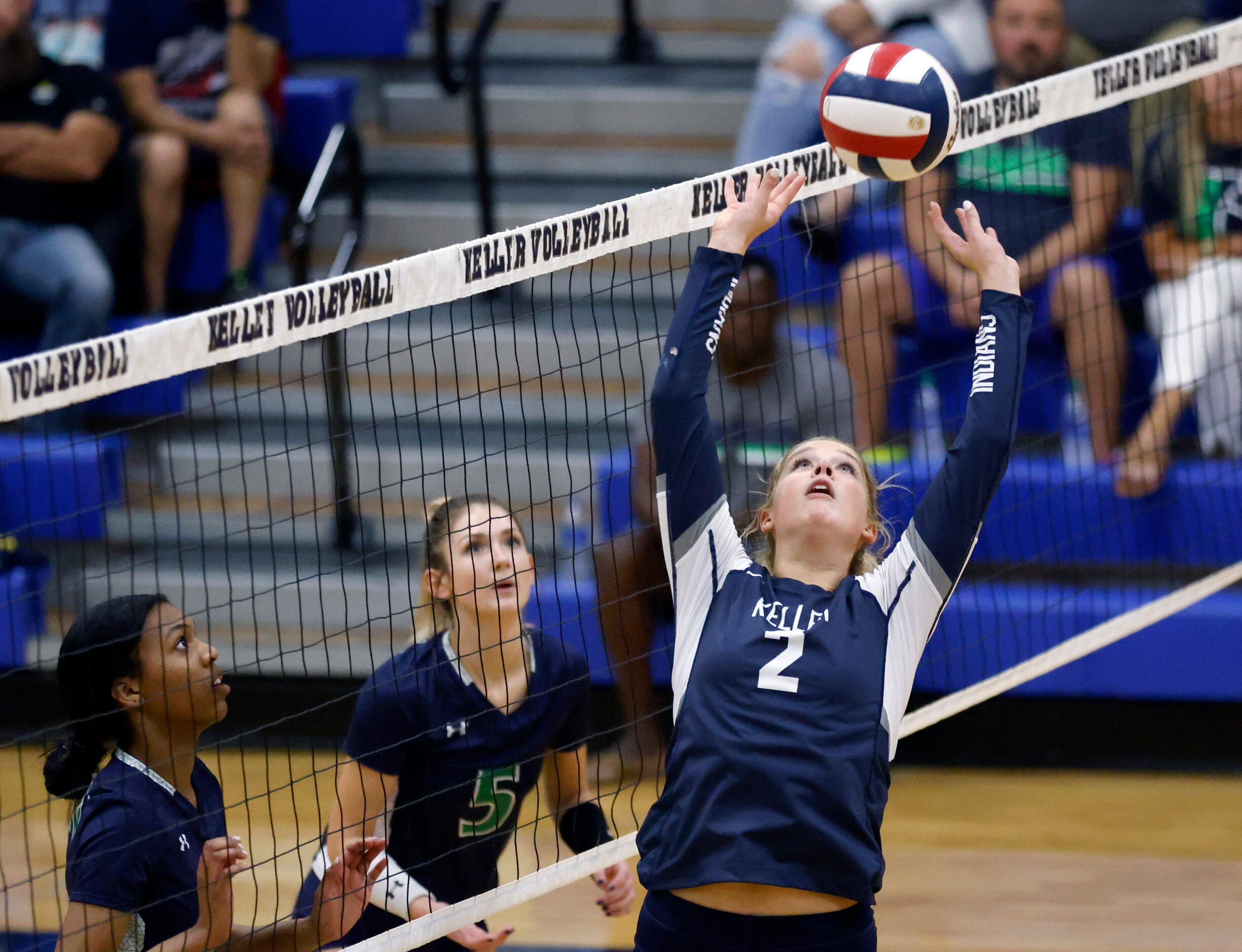 Keller High’s Taylor Polivka (2) sets the ball against Eaton High during the third set of...