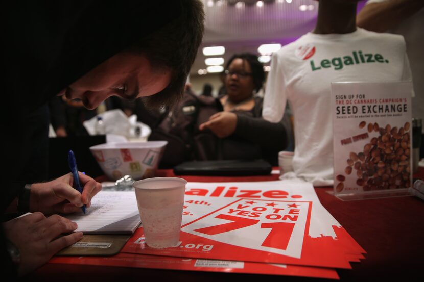 WASHINGTON, DC - FEBRUARY 28:  An attendee signs up for a seed exchange event during a...