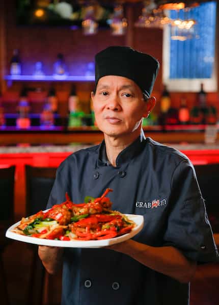 Chef Thanh Nguyen makes lobster with XO sauce at Crab City in Garland.