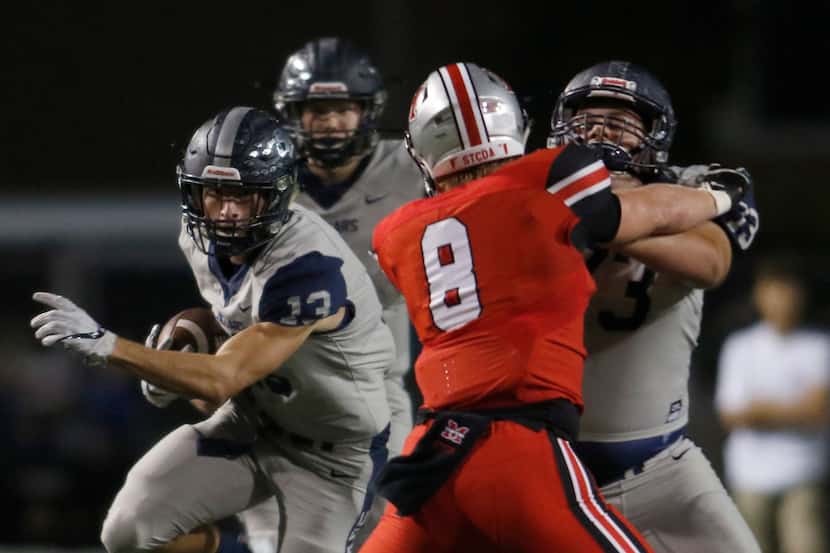 Flower Mound running back Pierce Hudgens (13) ran for 297 yards in Friday's 59-21 rout of...