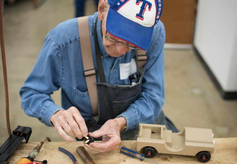 
Volunteer Harold Hulme, 85, assembles toy jeeps at The Hobby Crafters Foundation’s new...