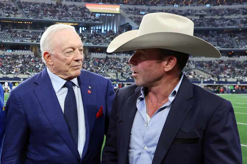 Jerry Jones meets with Taylor Sheridan before a Dallas Cowboys game at AT&T Stadium in...