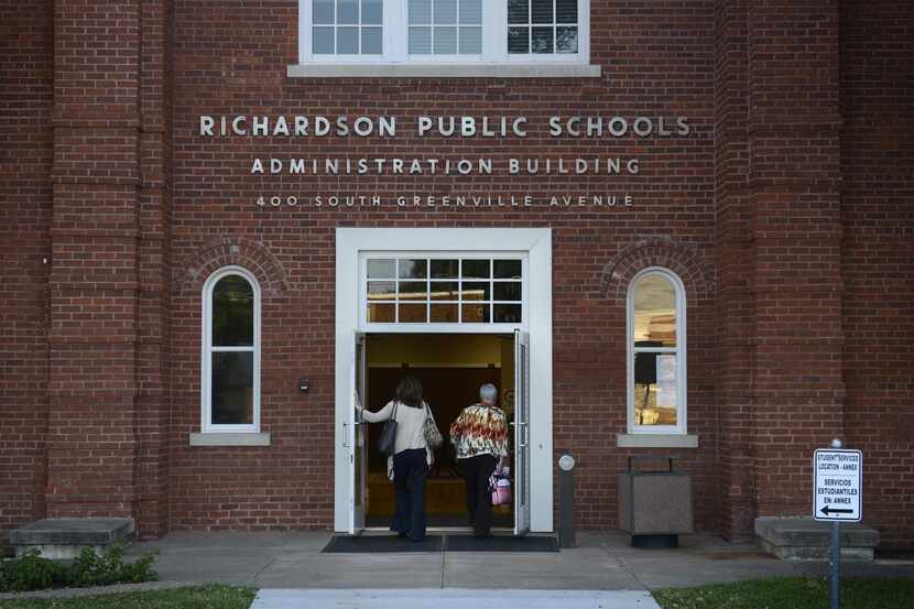 
Richardson ISD school board of trustee members Kristin Kuhne (left) and Lanet Greenhaw walk...