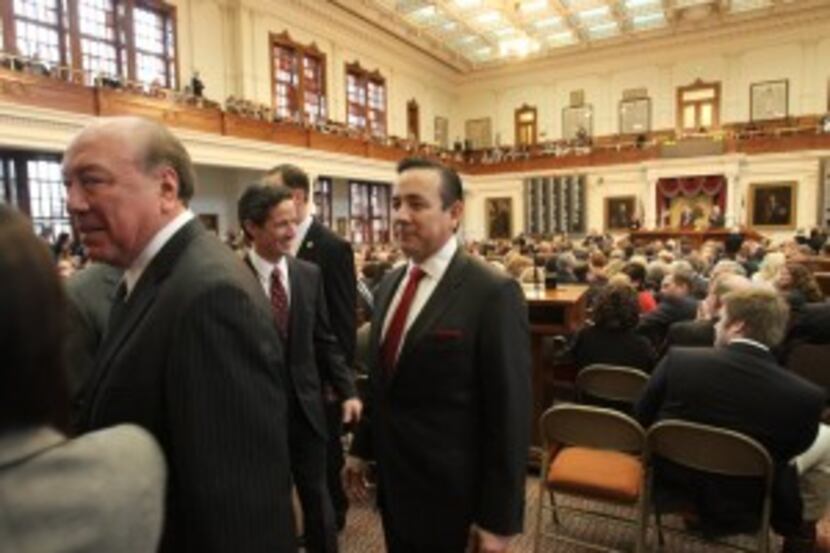  Sen. Carlos Uresti, D-San Antonio (center), was part of a Senate delegation to the House on...