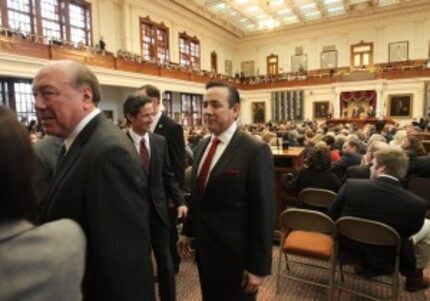  Sen. Carlos Uresti, D-San Antonio (center), was part of a Senate delegation to the House on...