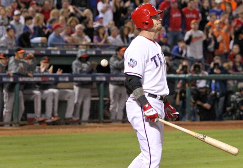 Texas left fielder Josh Hamilton is pictured after striking out to end the eighth inning in...