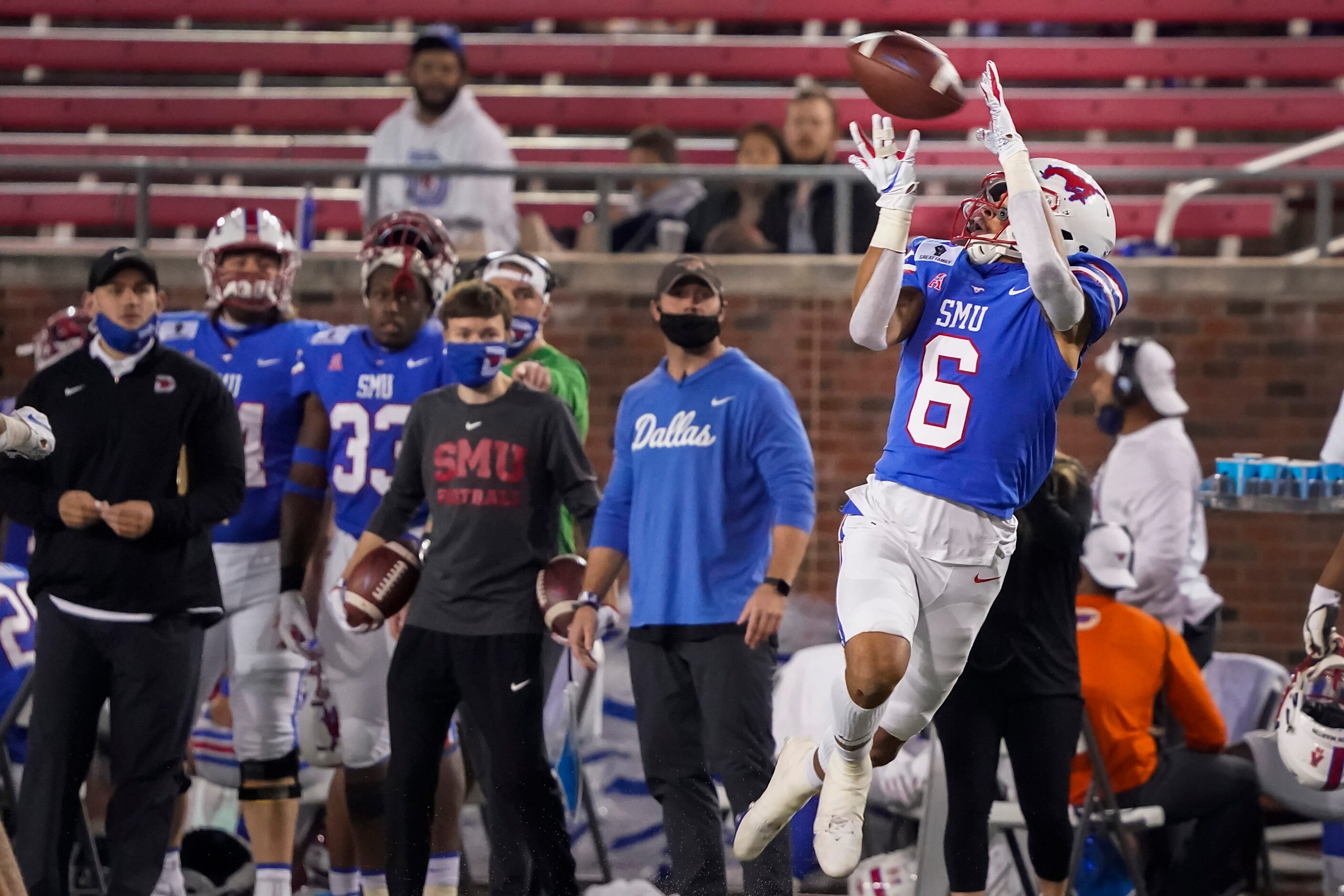 SMU wide receiver Austin Upshaw (6) hauls in a 42-yard touchdown pass during the third...