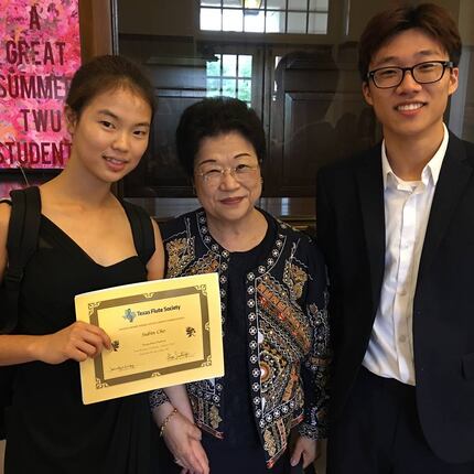 From left: Subin Cho, flute teacher Monica Song and Yeongjae Jo.