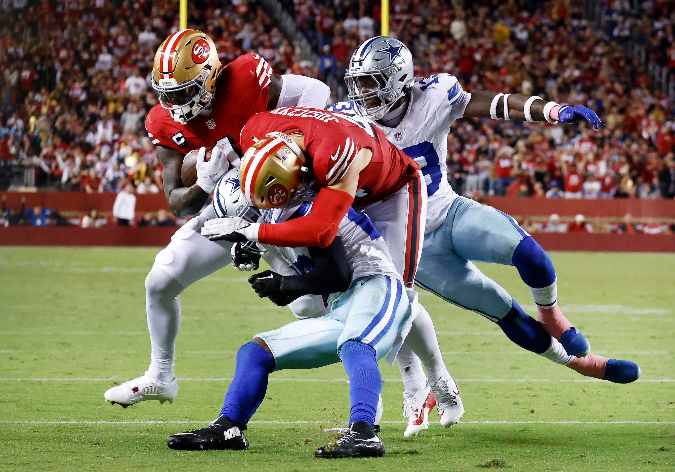 San Francisco 49ers wide receiver Deebo Samuel Sr. (1) carries the ball towards the goal...