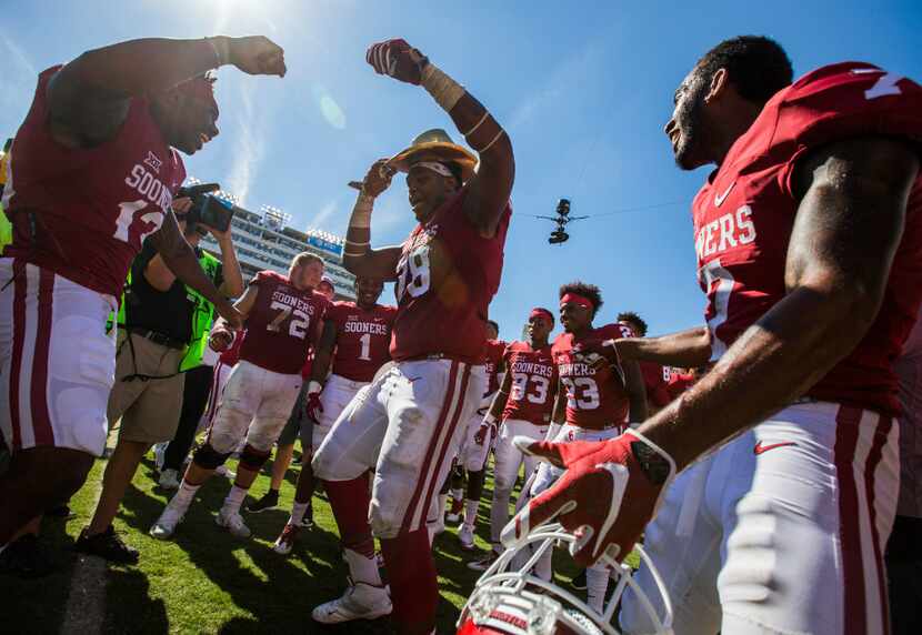 Oklahoma Sooners offensive tackle Orlando Brown (78) and his team joke around with the Gold...