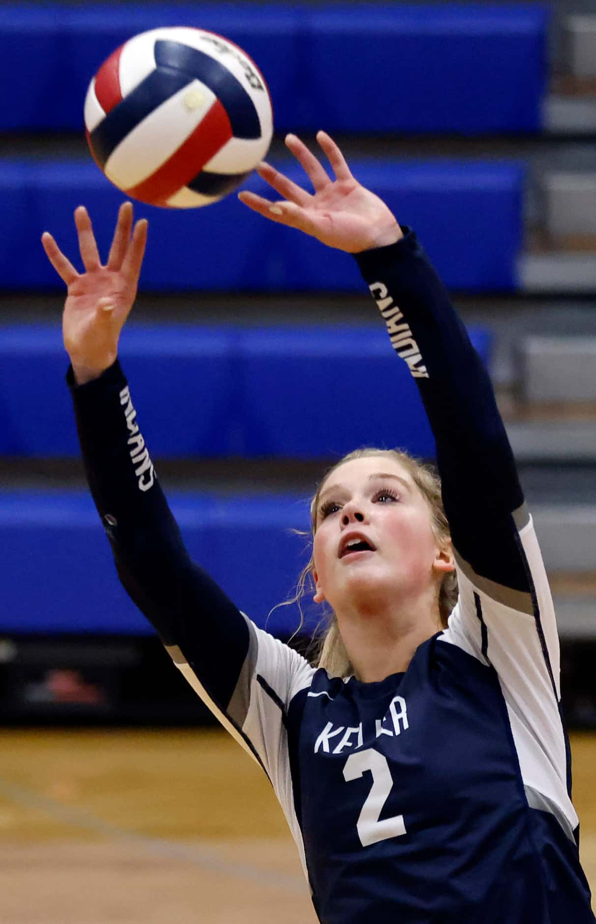 Keller High’s Taylor Polivka (2) sets the ball against Eaton High during the third set of...