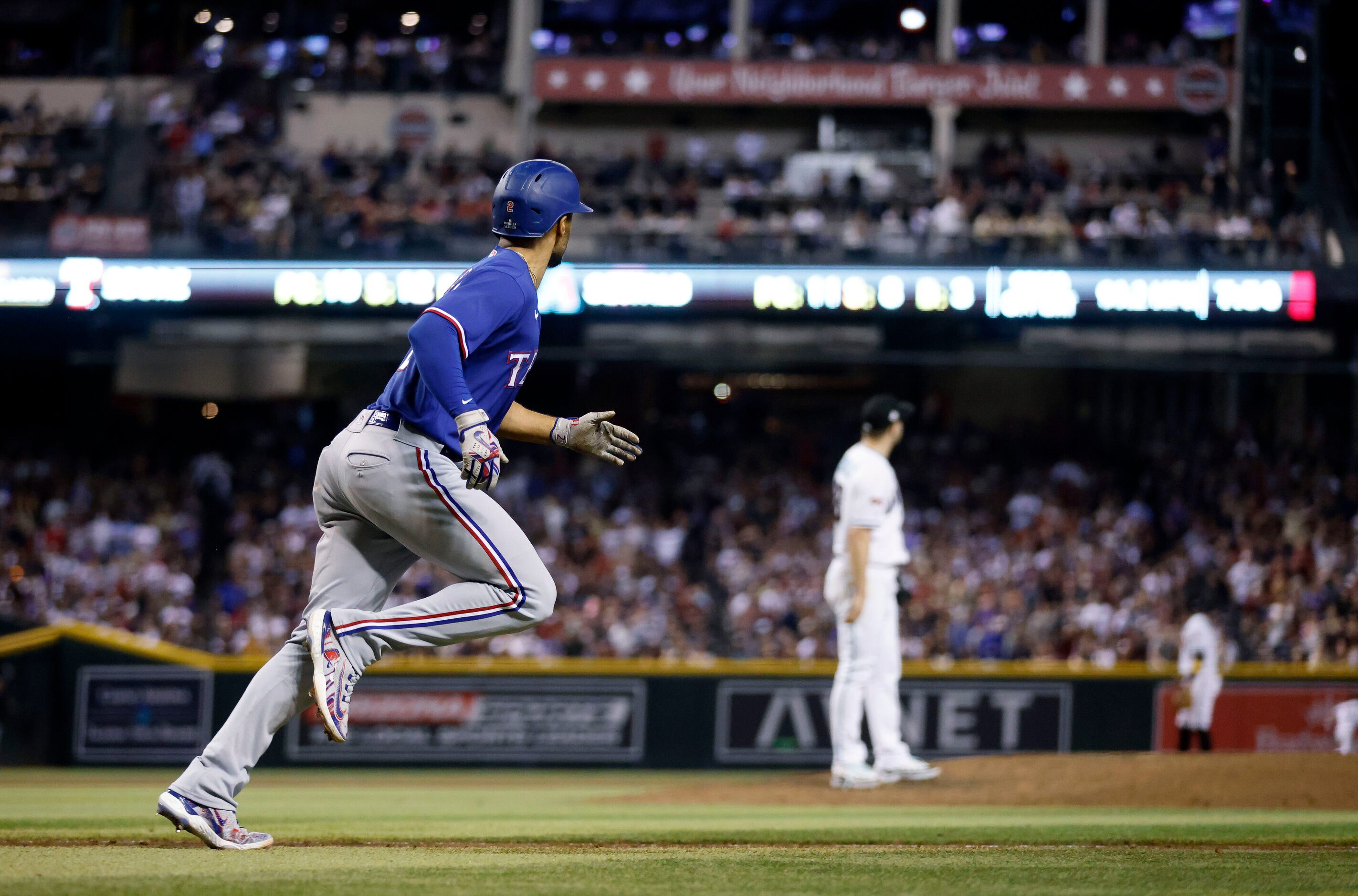 Texas Rangers second baseman Marcus Semien (2) hit a home run to left center Arizona...