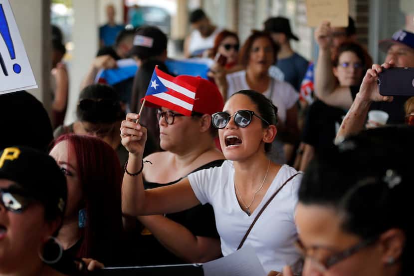 Hundreds of people from North Texas' Puerto Rican community protested Gov. Ricardo Rosselló...