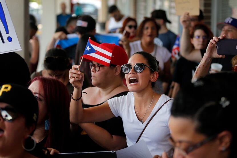 Puerto Rico's governor is gone, but protesters say more change is