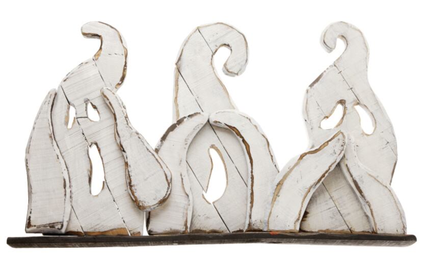 A ghostly tabletop plaque — “Hear no evil, see no evil, speak no evil” — is made from...