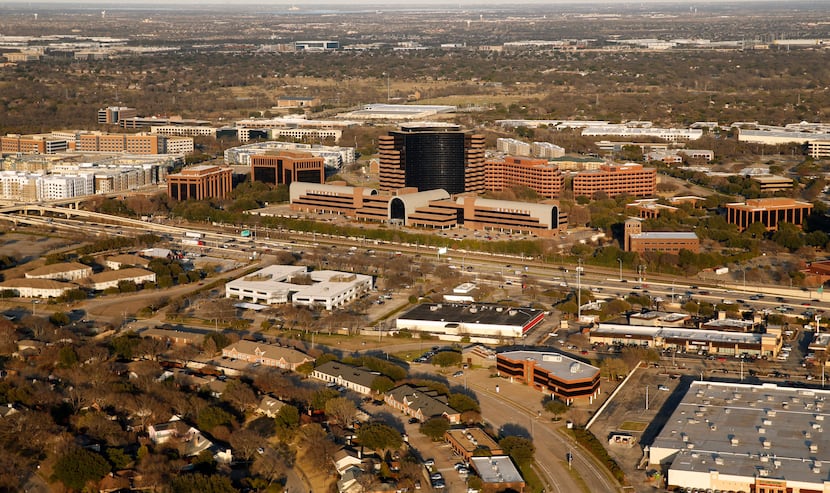 The landmark RealPage headquarters building stretches along U.S. Highway 75 in Richardson.