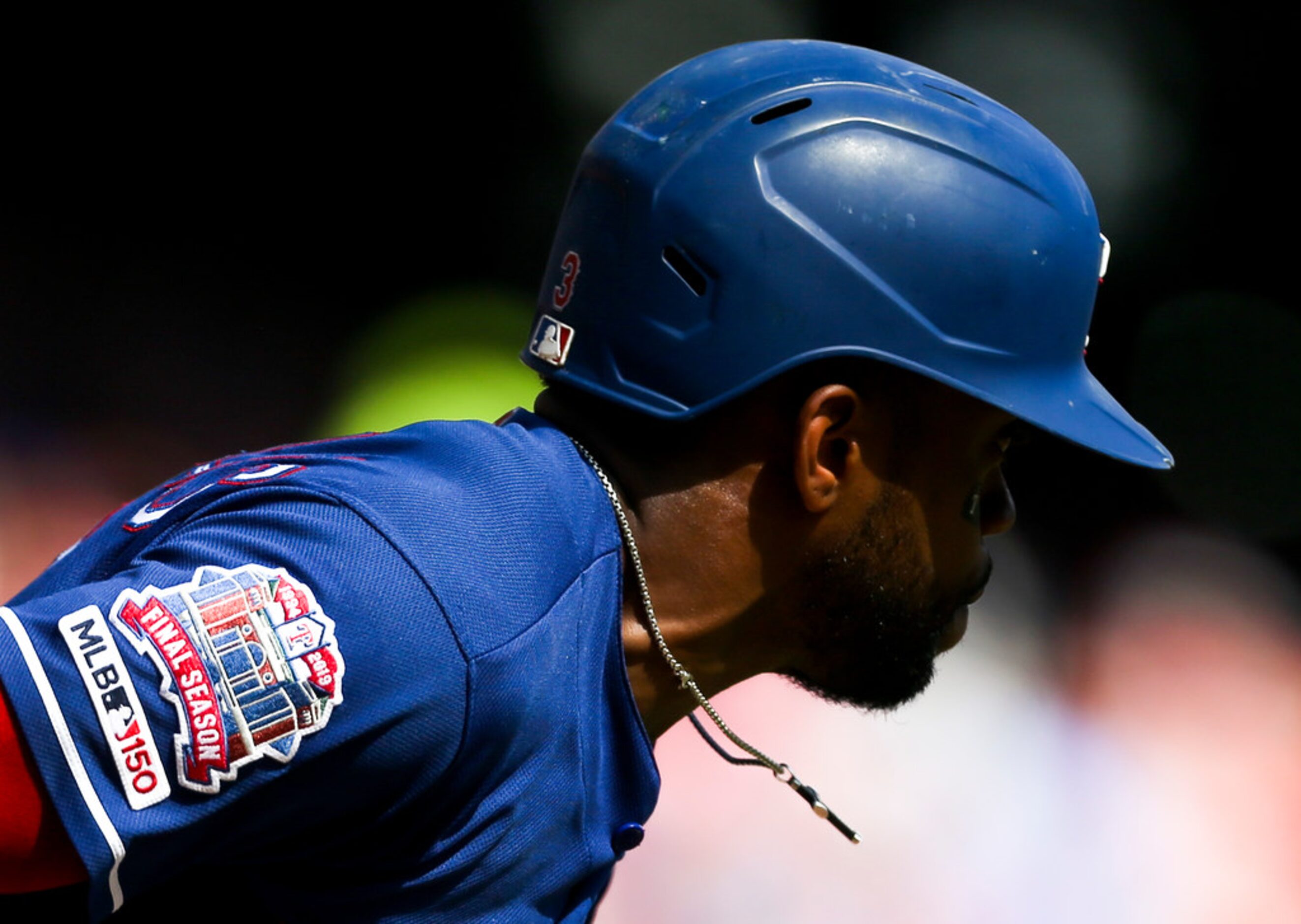 Texas Rangers center fielder Delino DeShields (3) runs to first during a MLB game between...