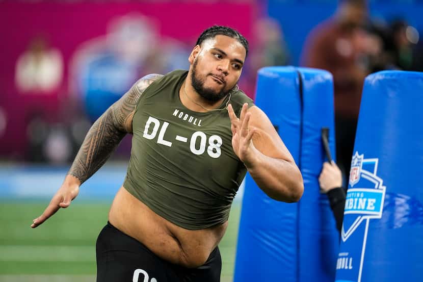 FILE - Baylor defensive lineman Siaki Ika runs a drill at the NFL football scouting combine...