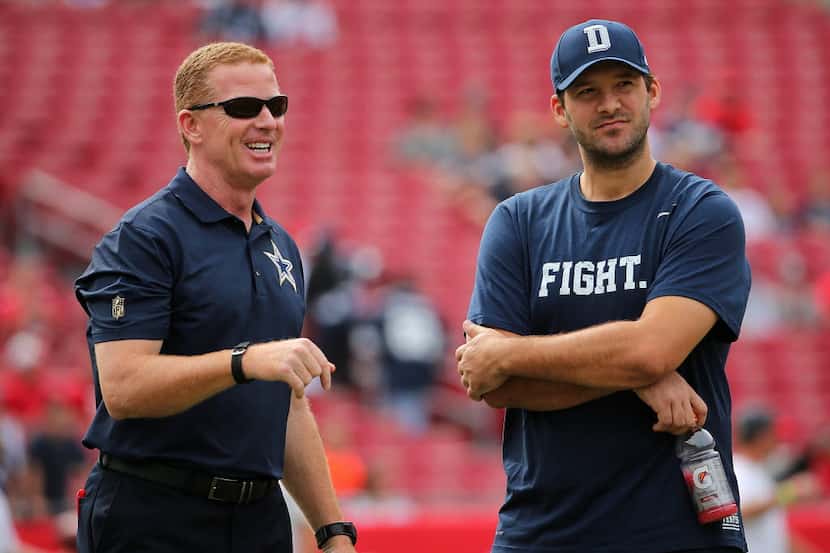 TAMPA, FL - NOVEMBER 15:  Head coach Jason Garrett and  Tony Romo #9 of the Dallas Cowboys...