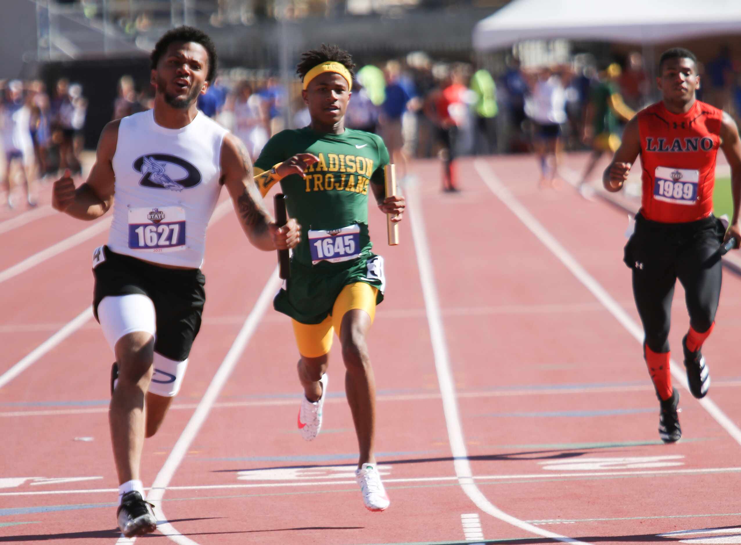 Savion Williams of Dallas Madison competes in the 3A boys 4x100 relay during the UIL state...