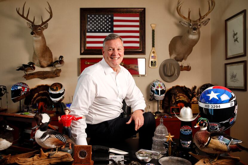 Texas Motor Speedway general manager Rob Ramage poses for a photo in his office filled with...