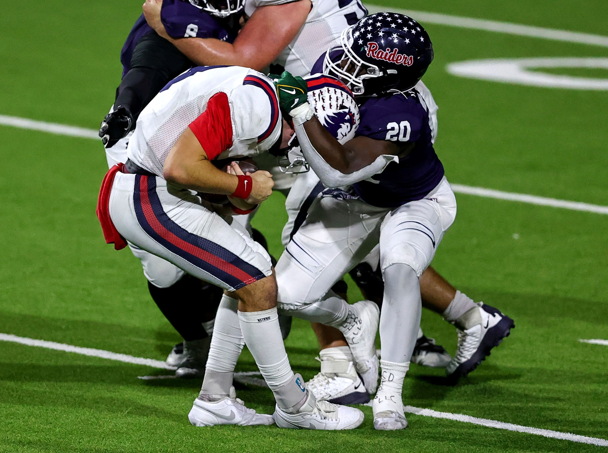 Denton Ryan defensive lineman Kha'Ron Freeman-Wade (20) sacks Richland quarterback Drew...