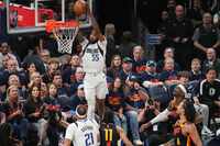 Dallas Mavericks forward Derrick Jones Jr. (55) dunks the ball past Oklahoma City Thunder...