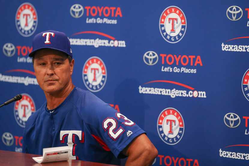 Don Wakamatsu, who has been named interim manager of the Texas Rangers, addresses members of...