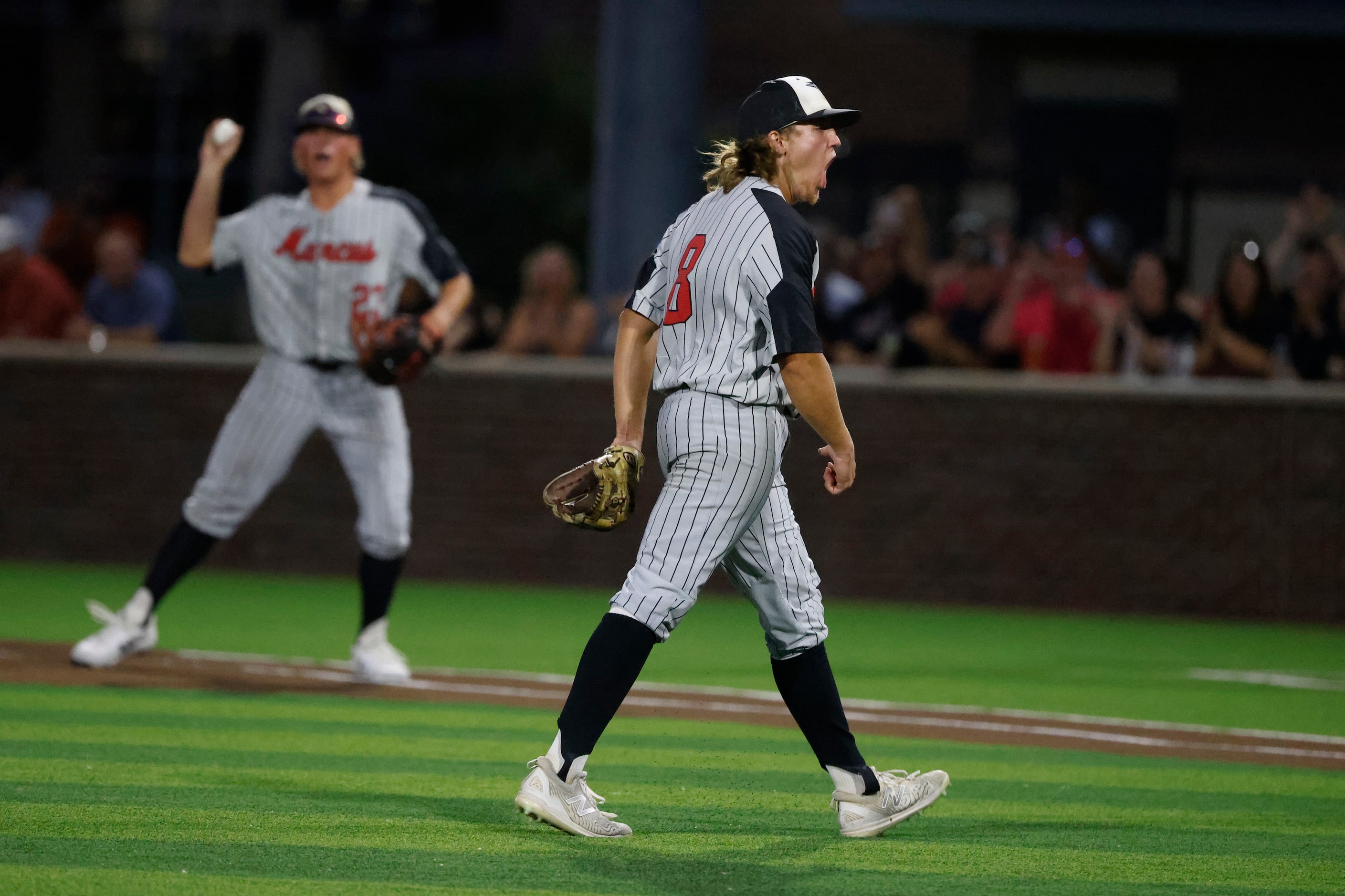 Flower Mound Marcus pitcher Nathan Harmon reacts to the final out against Keller during the...