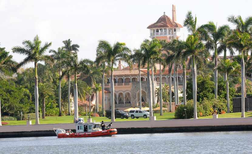 PALM BEACH, FL - NOVEMBER 24:  A US Coast Guard boat passes through the Mar-a-Lago Resort...