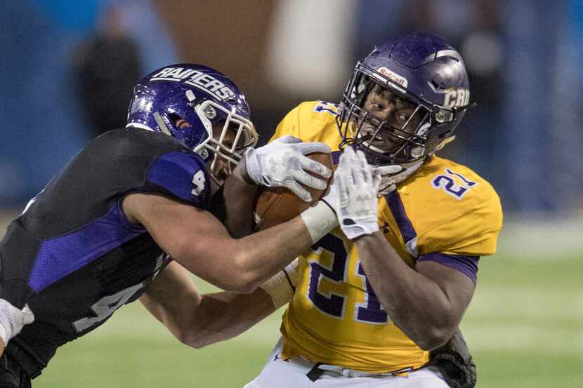 FILE - In this Dec. 15, 2017, file photo, Mount Union's Danny Robinson (4) tackles Mary...