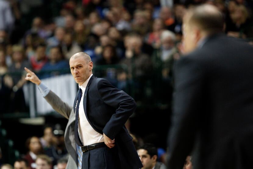 Dallas Mavericks head coach Rick Carlisle looks back at Chicago Bulls head coach Tom...
