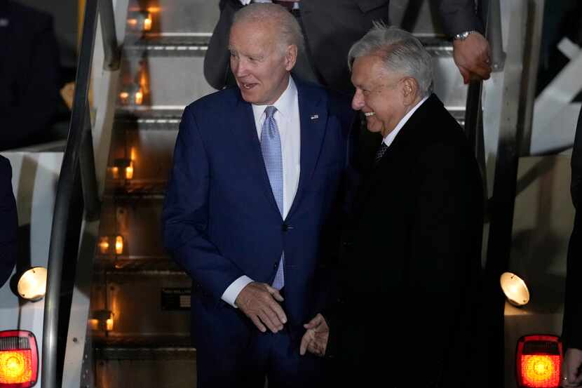 U.S. President Joe Biden is greeted by Mexican President Andres Manuel Lopez Obrador at his...