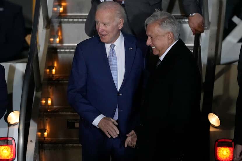 U.S. President Joe Biden is greeted by Mexican President Andres Manuel Lopez Obrador at his...