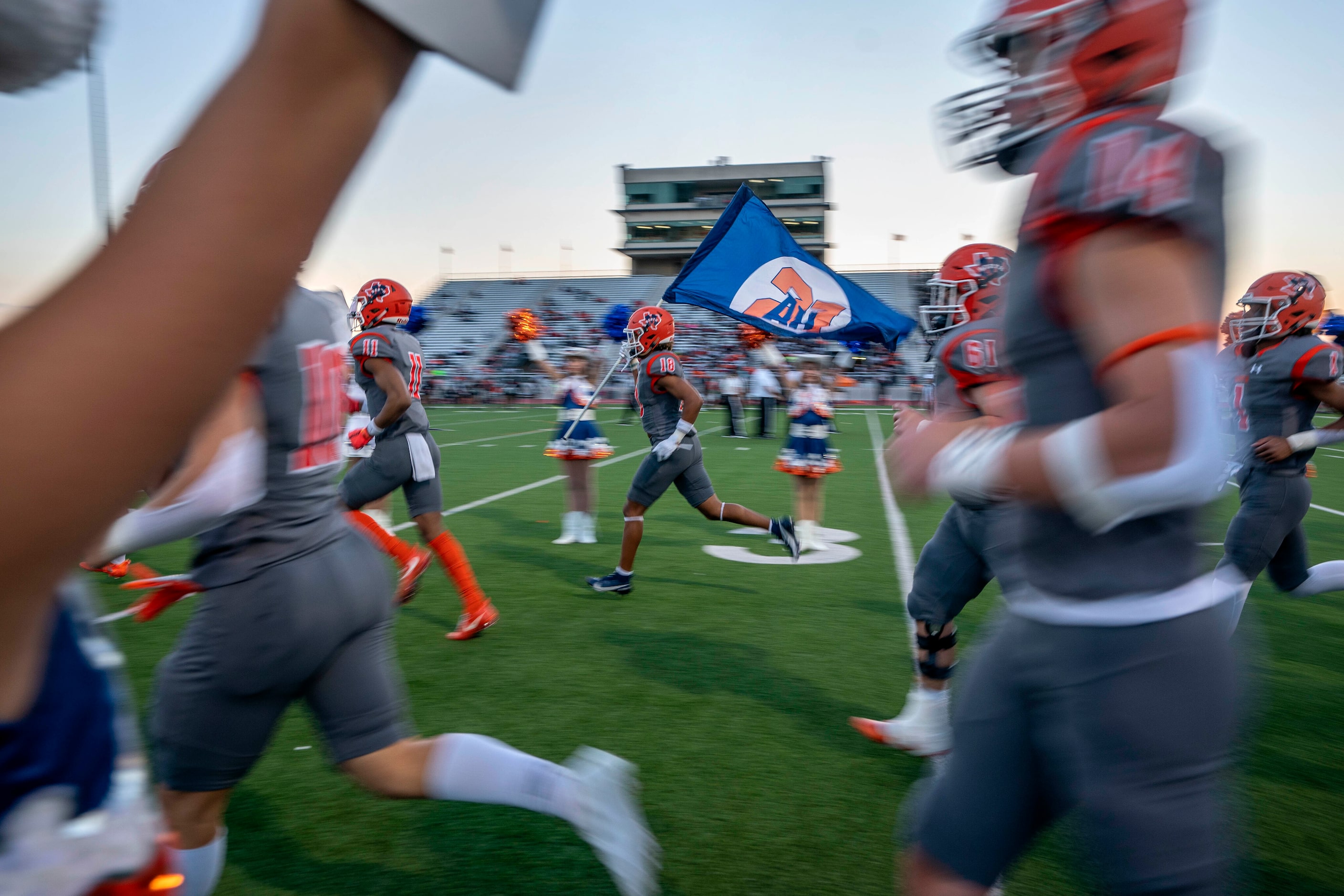 McKinney North takes the field before a high school football game against Lancaster on...