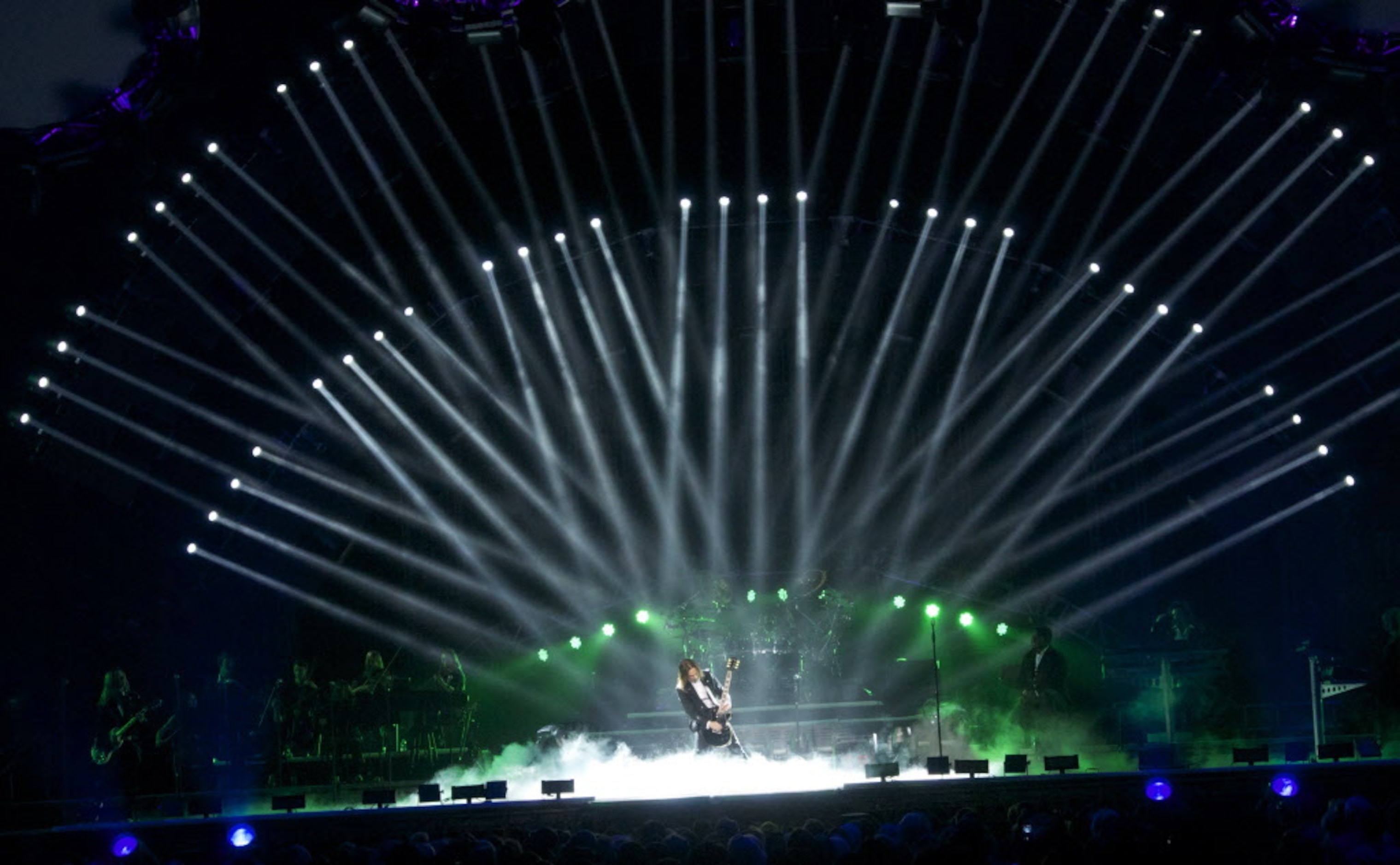 Al Pitrelli plays under a huge fan of lights as the Trans-Siberian Orchestra performs "Lost...