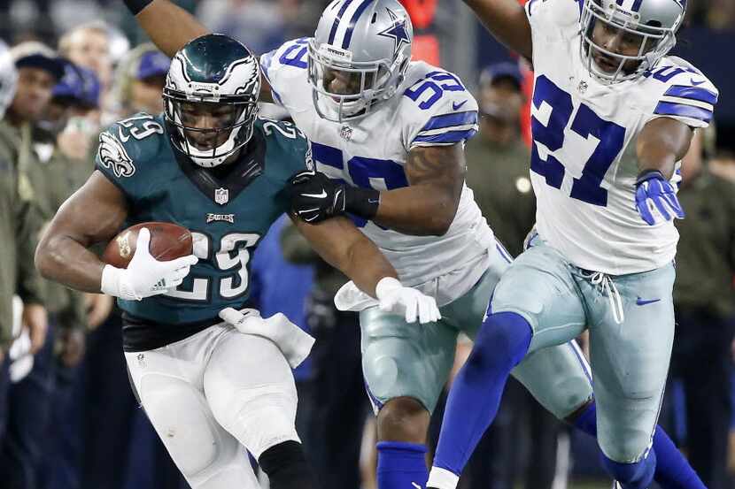 Philadelphia Eagles running back DeMarco Murray (29) is pushed out of bounds by Dallas...