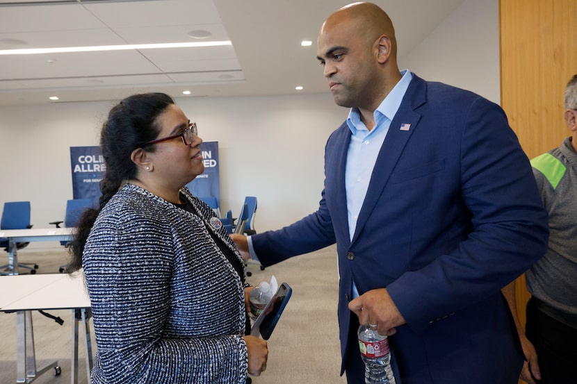 U.S. Rep. Colin Allred, D-Dallas, speaks with Neel Gonuguntla, a community leader from...