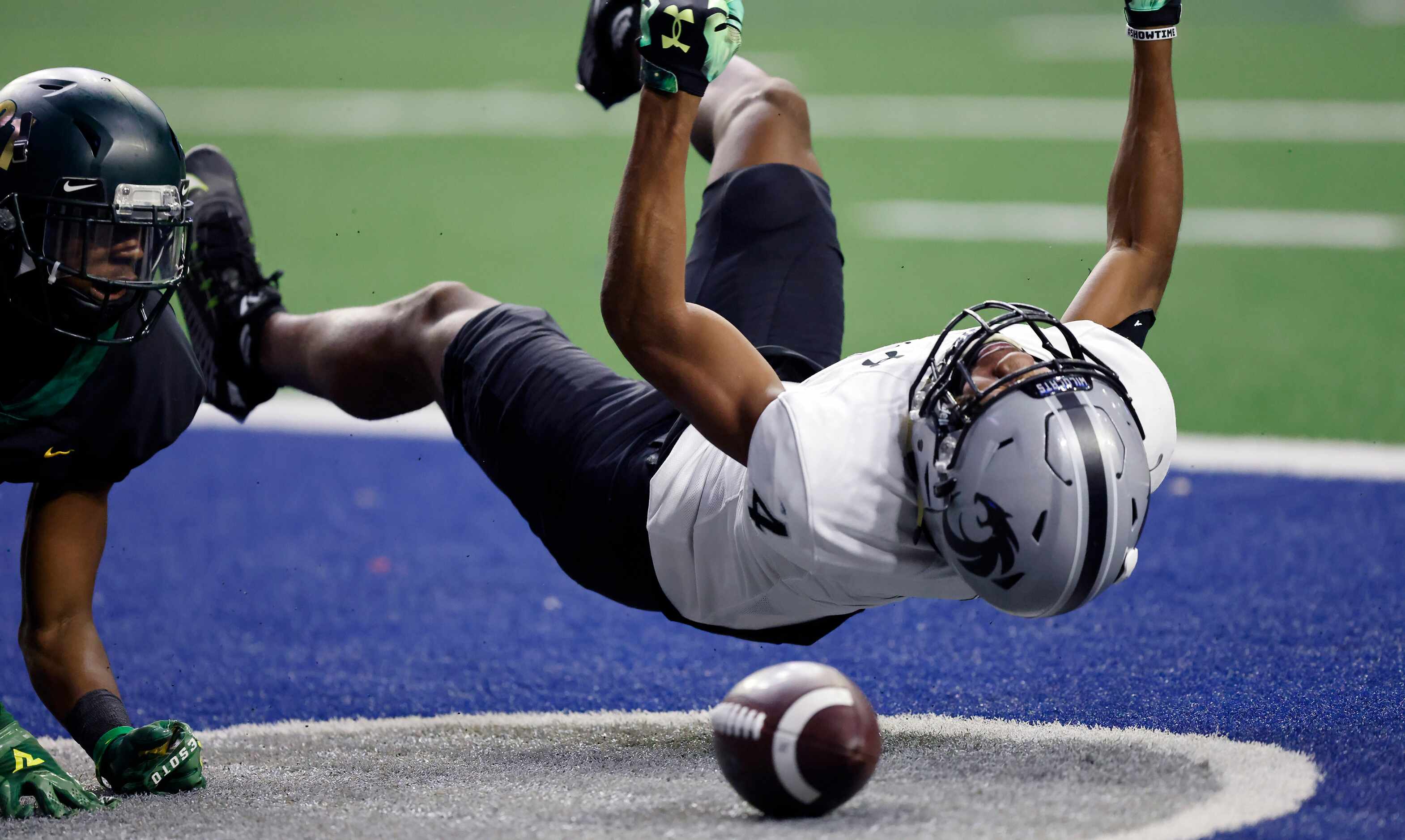 Denton Guyer receiver Josiah Martin (4) bounces off the turf in disgust after failing to...