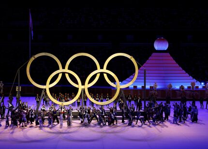 Entertainers perform during the opening ceremony for the postponed 2020 Tokyo Olympics at...