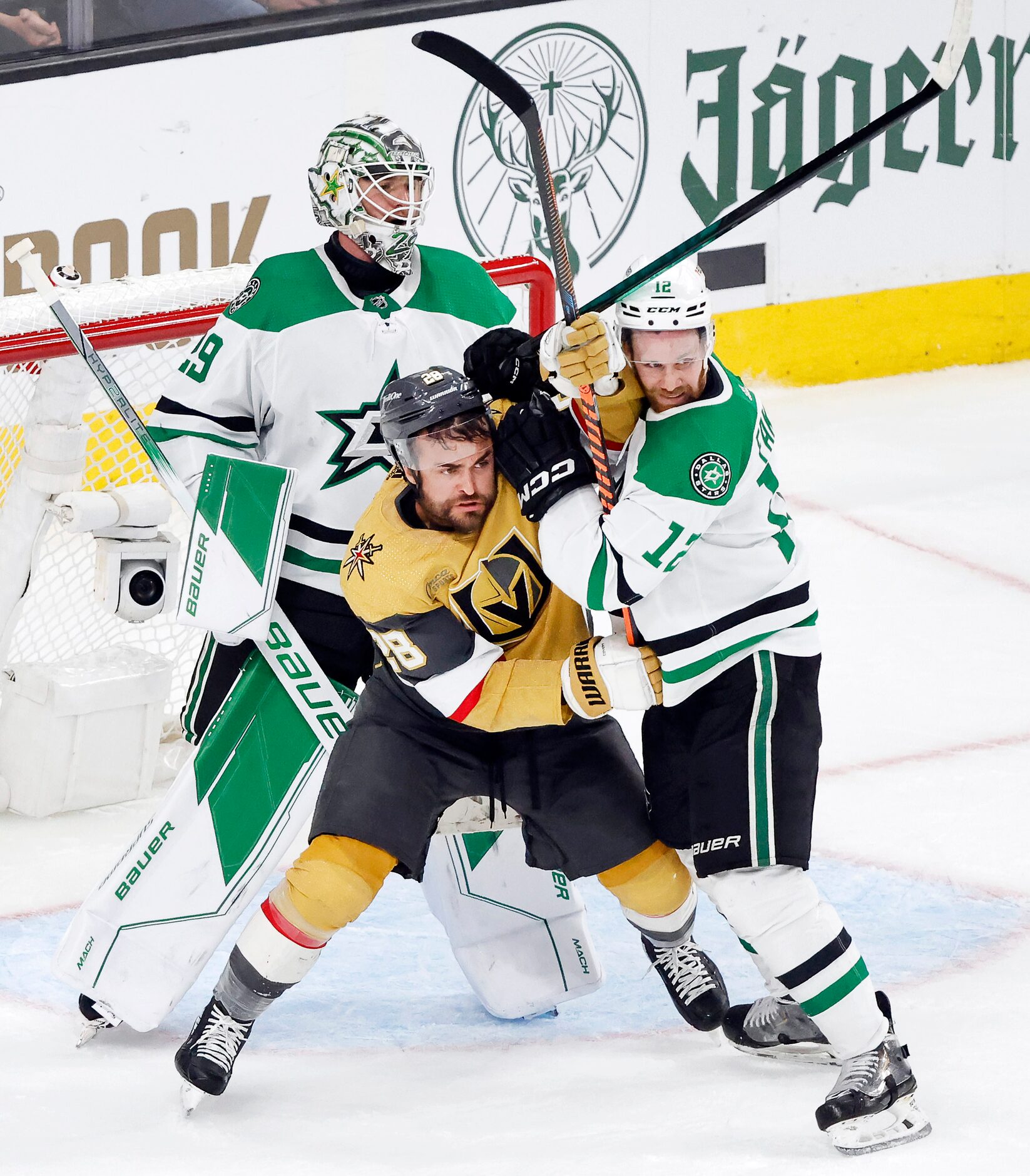 Dallas Stars center Radek Faksa (12) fights off Vegas Golden Knights left wing William...