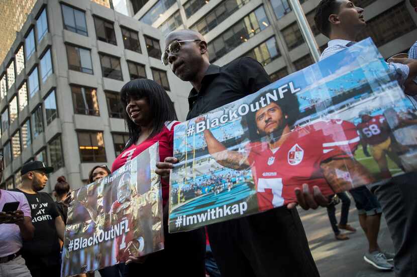 NEW YORK, NY - AUGUST 23: Activists rally in support of NFL quarterback Colin Kaepernick...