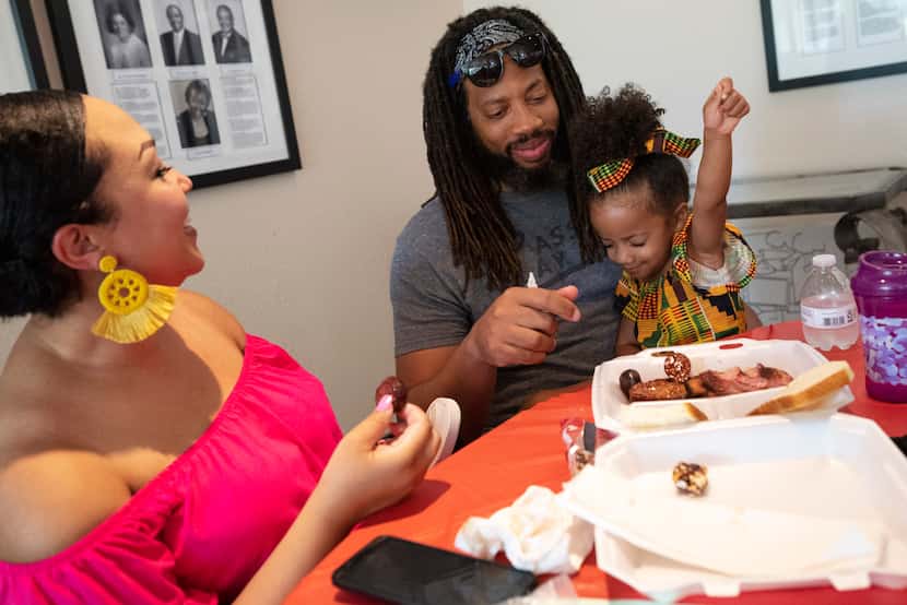 Egypt Shurn enjoyed the food she shared with parents Vernicia and Tommy Shurn on Saturday.