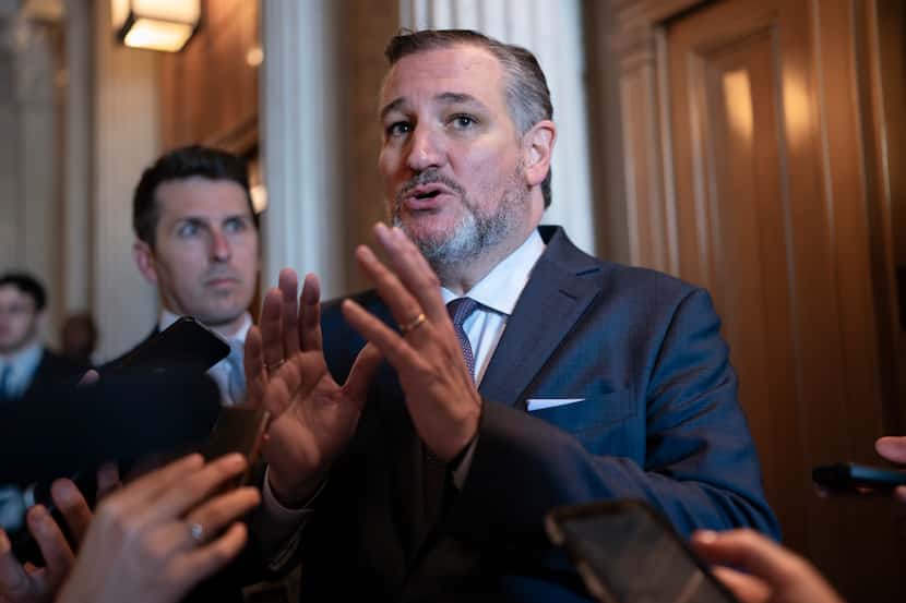 Sen. Ted Cruz, R-Texas, defends former President Donald Trump while telling reporters...