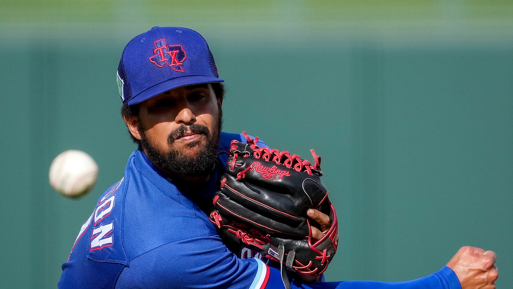 Texas Rangers pitcher Grant Anderson delivers during the ninth inning of a spring training...