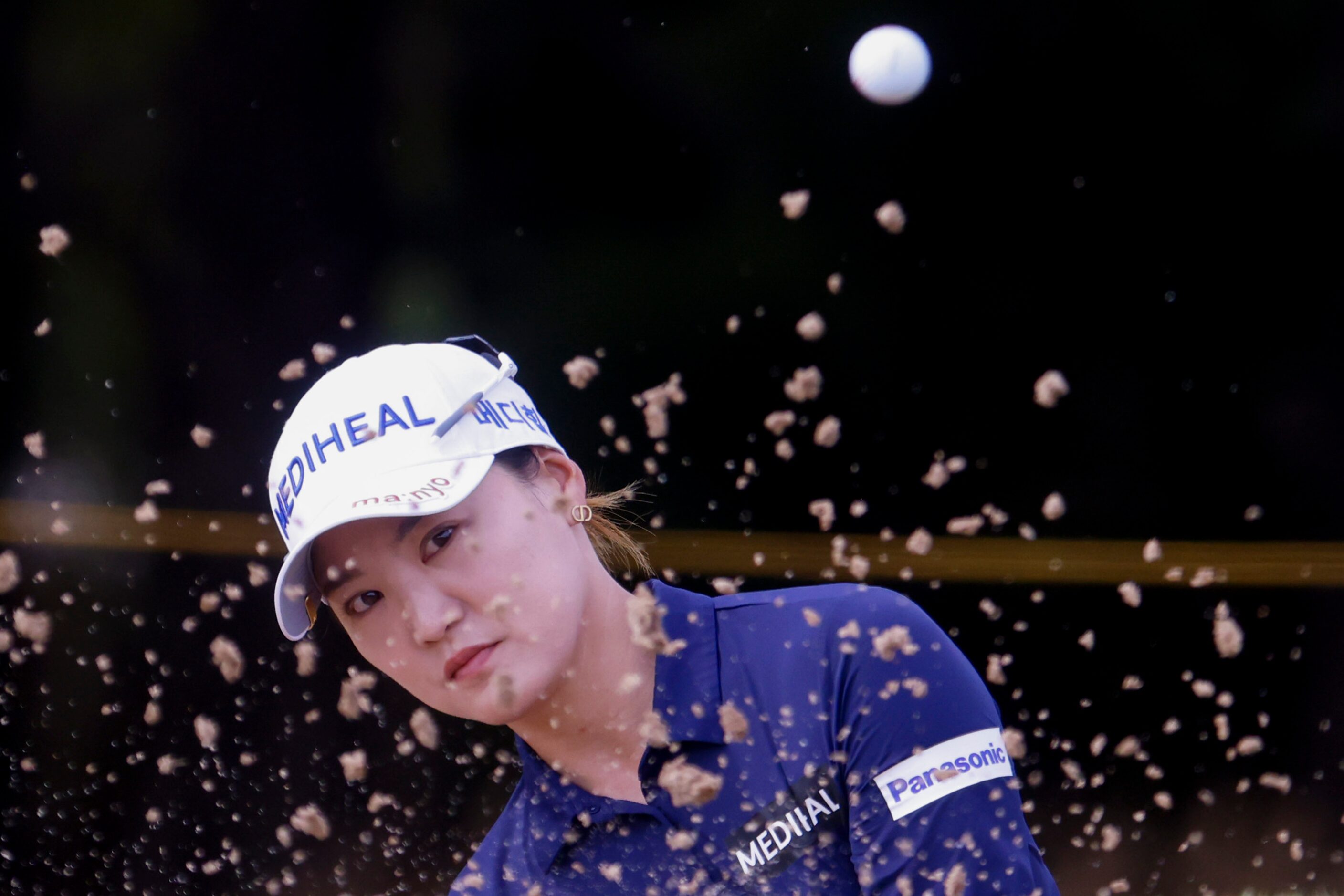 So Yeon Ryu of South Korea hits out of a sand trap on the 11th fairway during the first...